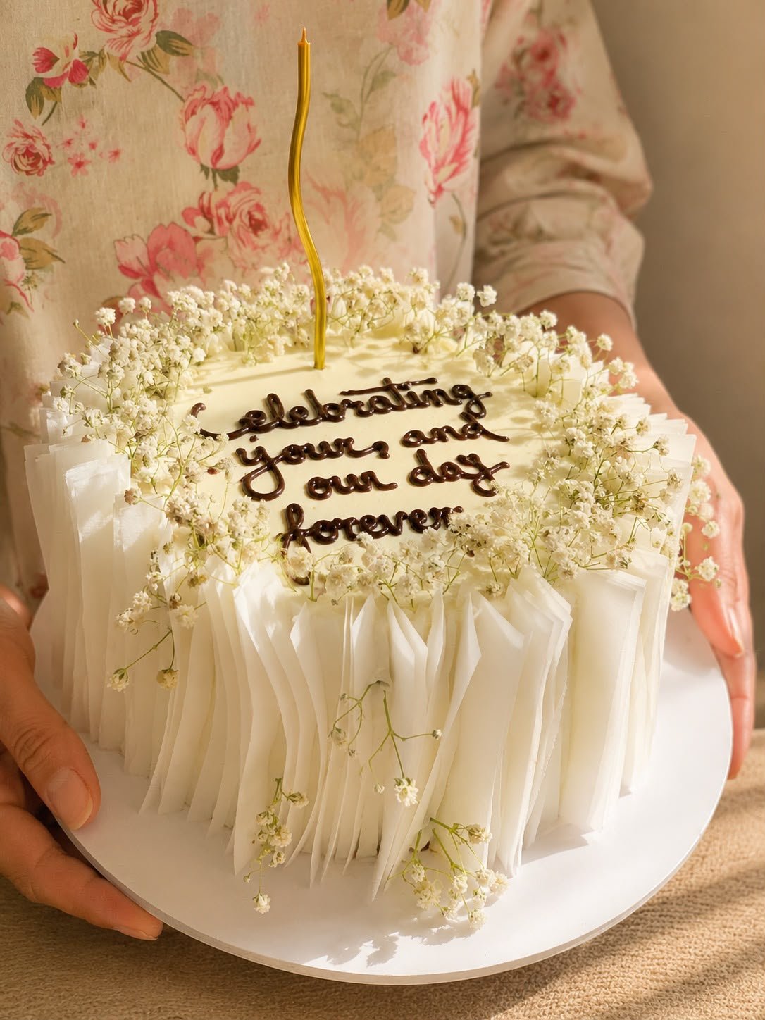 White ruffle cake with baby's breath and hand-piped message